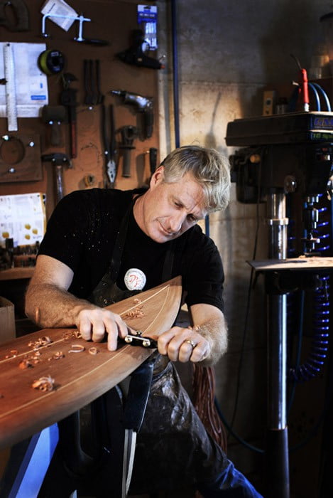 Gary Carving A Wooden Surfboard