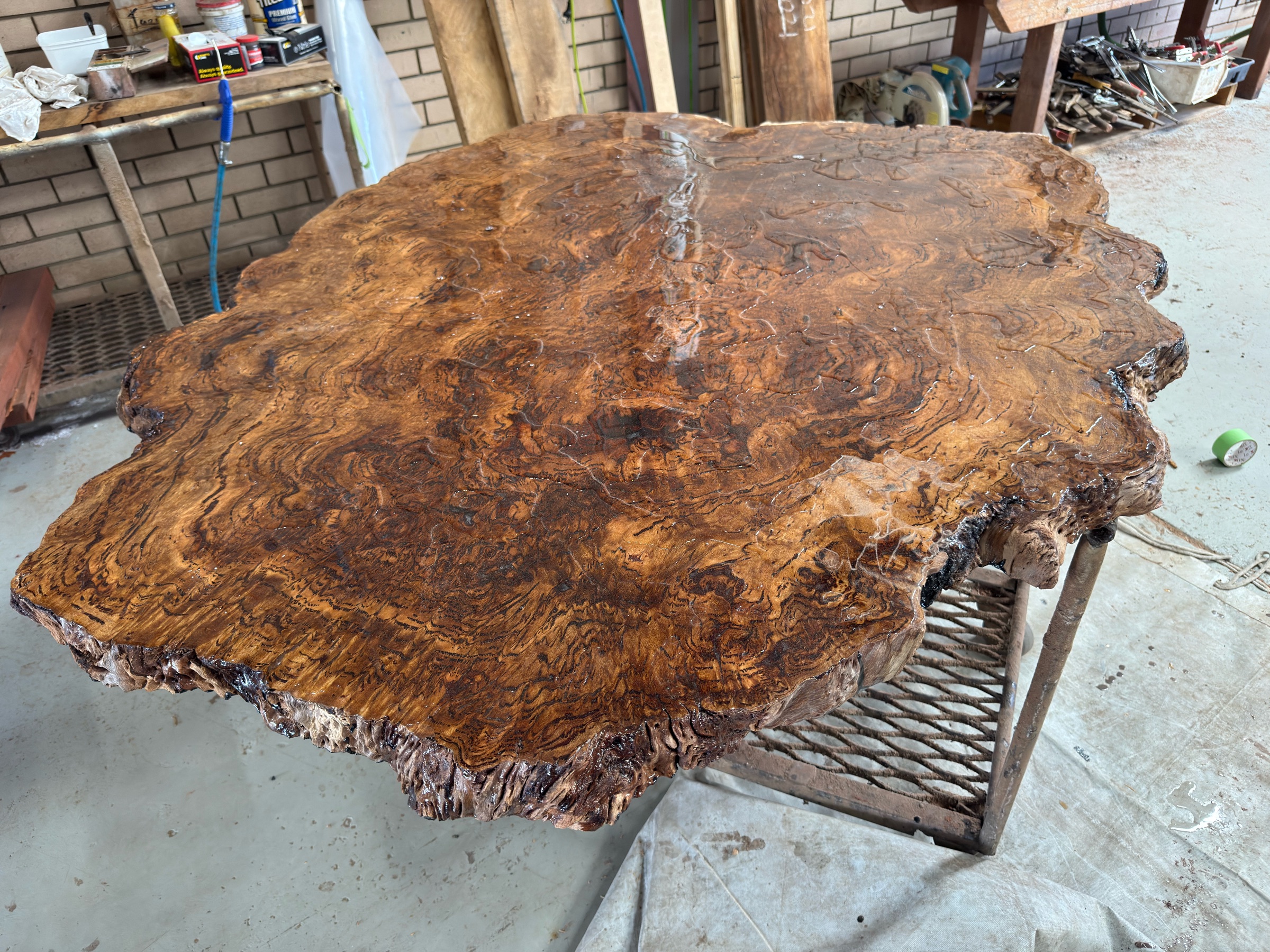 Burl slab tabletop in the JahRoc workshop